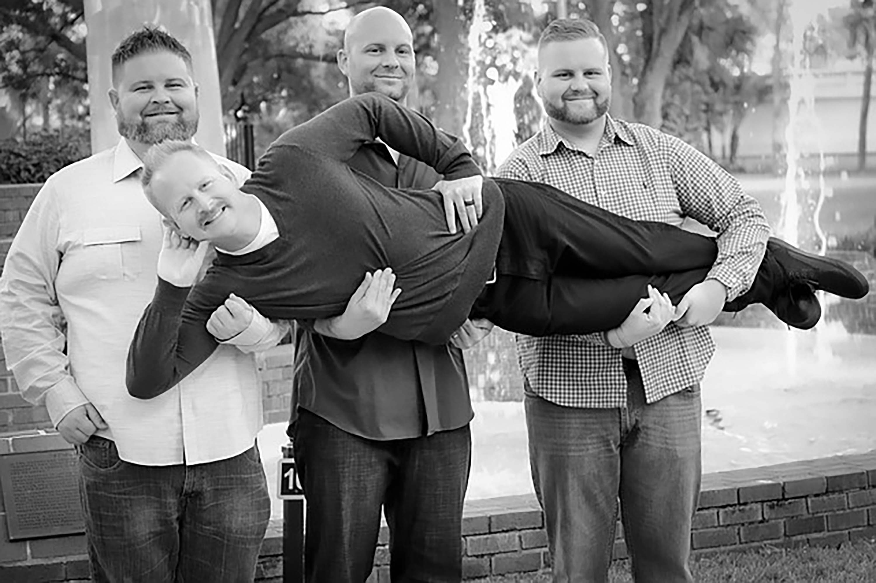 male teacher group being silly
